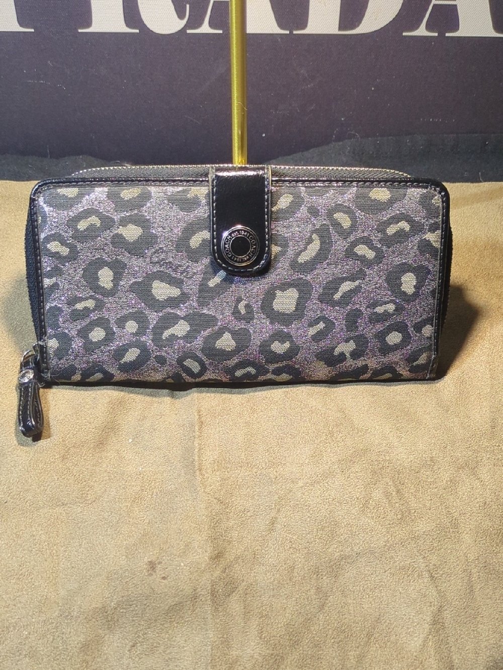 Coach Zip-around Leopard Print Wallet in Black and Gray with Purple Sheen $25